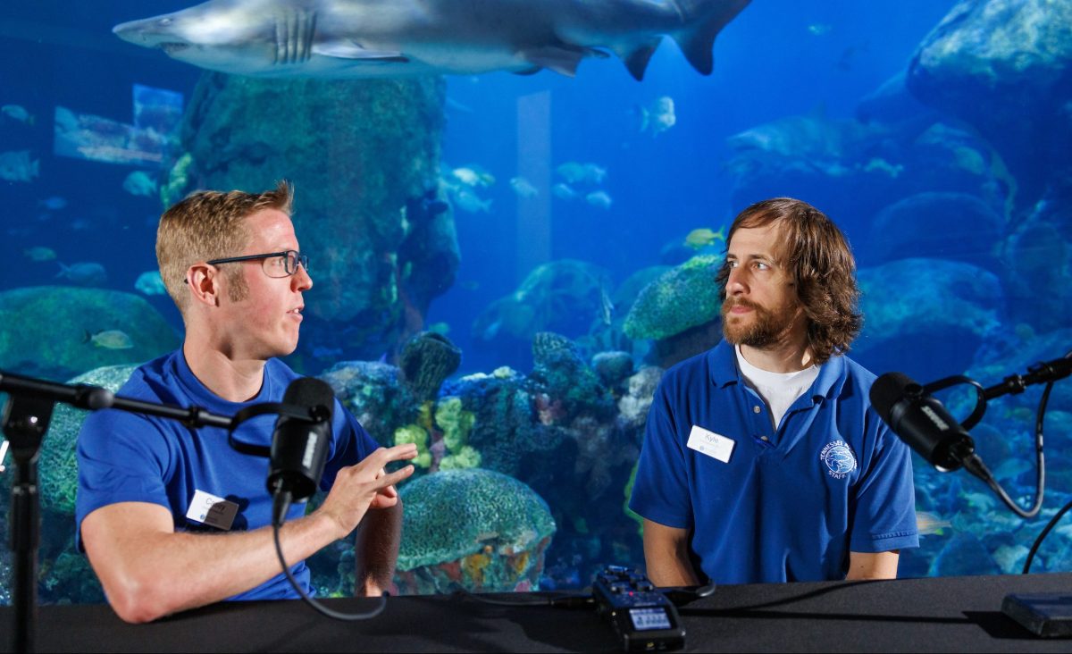 Communications Specialist Casey Phillips, left, interviews Senior Aquarist Kyle McPheeters for the Tennessee Aquarium's podcast, The Podcast Aquatic.