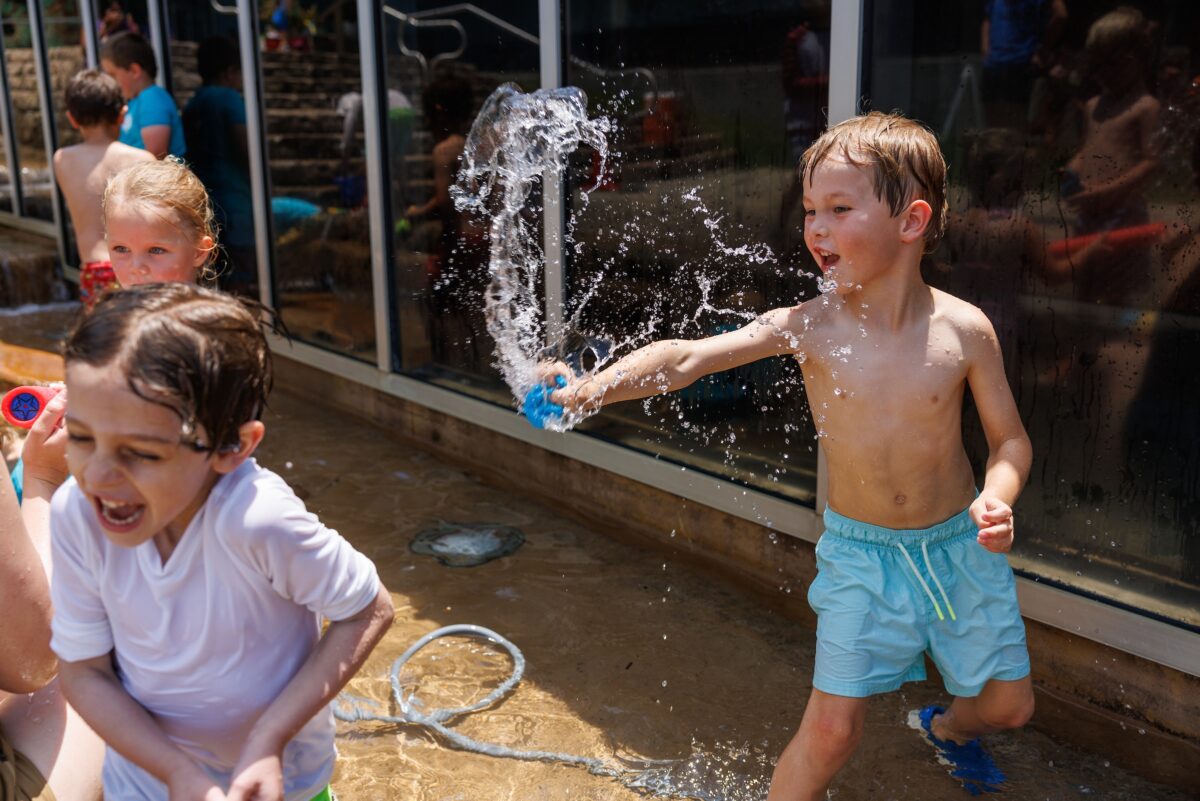 Campers enjoy water day on the Plaza at the Tennessee Aquarium's Summer Camp.